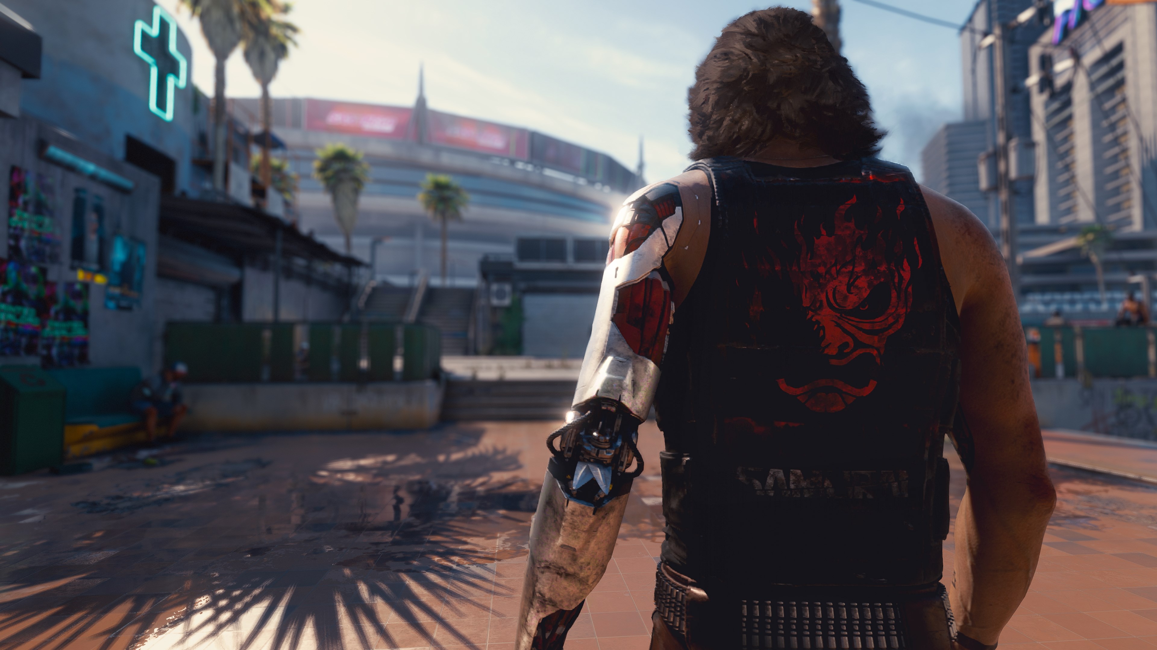 Behind-the-back view of Keanu Reeves' Johnny Silverhand in Cyberpunk 2077.