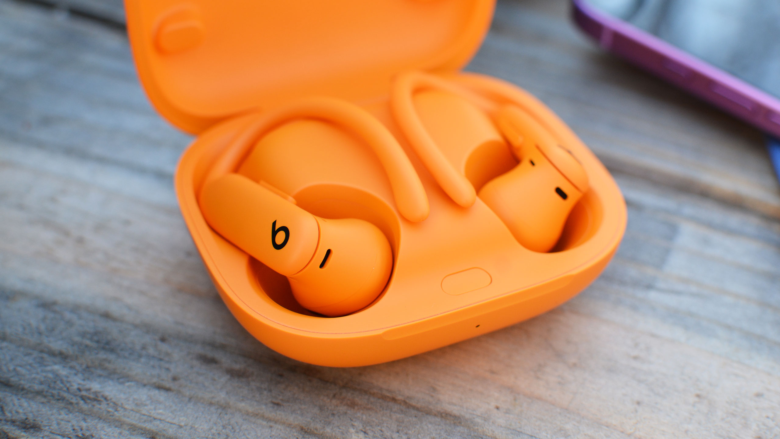 The Powerbeats Pro 2 case is smaller, but it has to be bigger than most to accommodate those hooks. 