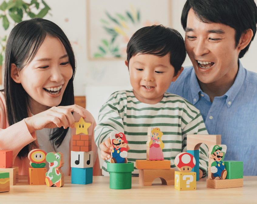 A family enjoying Mario toys.