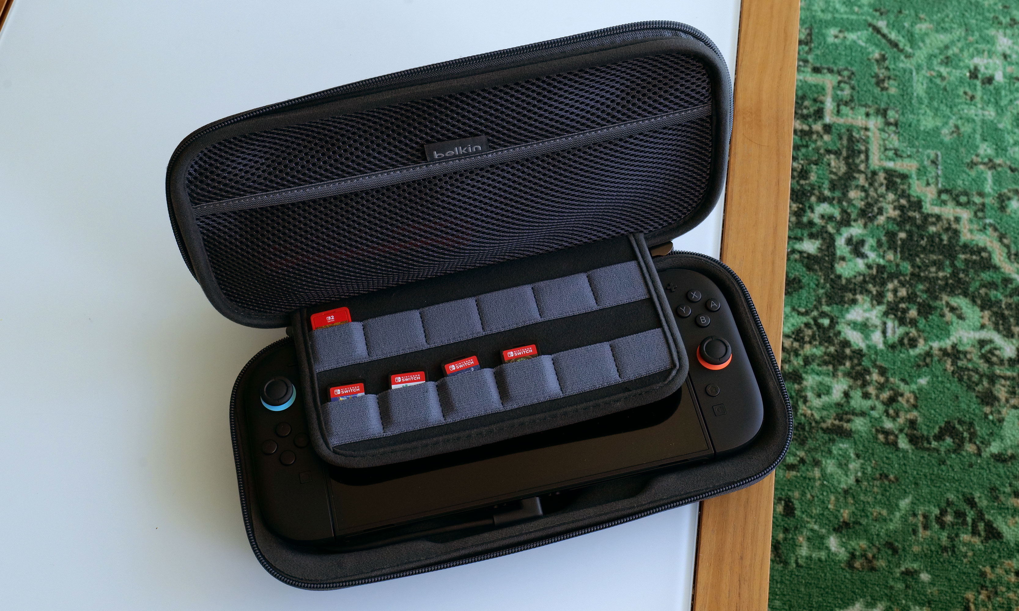 The Belkin Charging Case for Nintendo Switch 2 come with a padded flap that holds up 12 game cartridges. 
