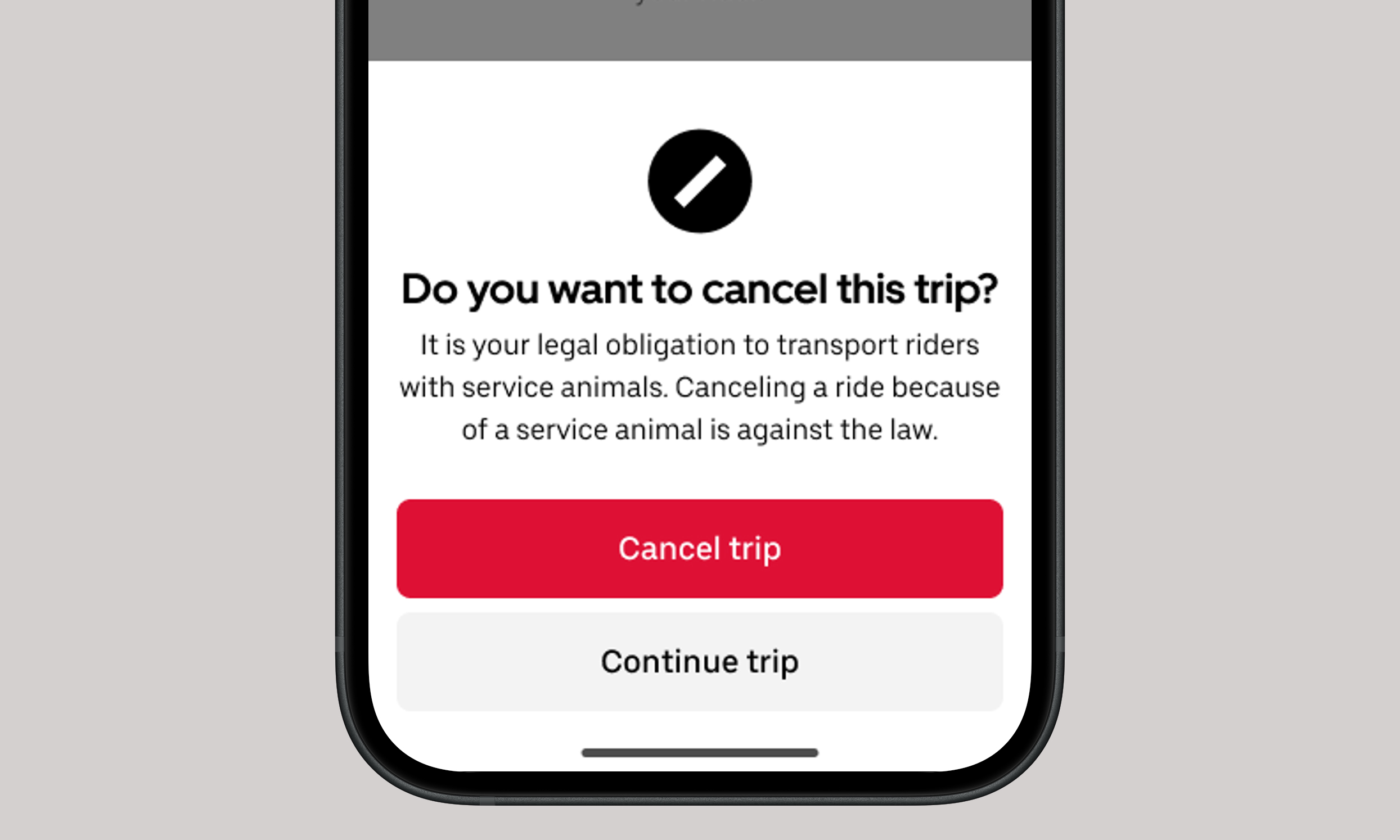 Screenshot of a warning in the Uber app for drivers. “It is your legal obligation to transport riders with service animals. Canceling a ride because of a service animal is against the law.”