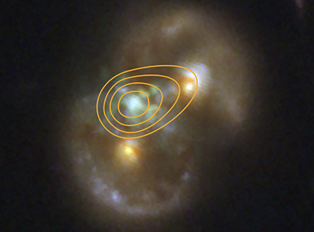 Space image. The infinity galaxy overlaid with info supporting a supermassive black hole in between two colliding galaxies.