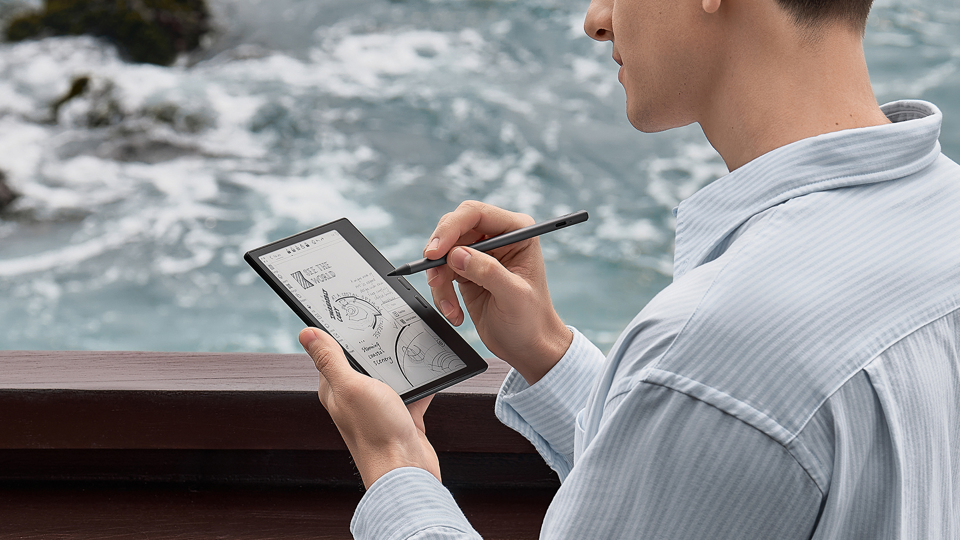 Photo of a person taking notes on the Boox Go 7 E Ink tablet.