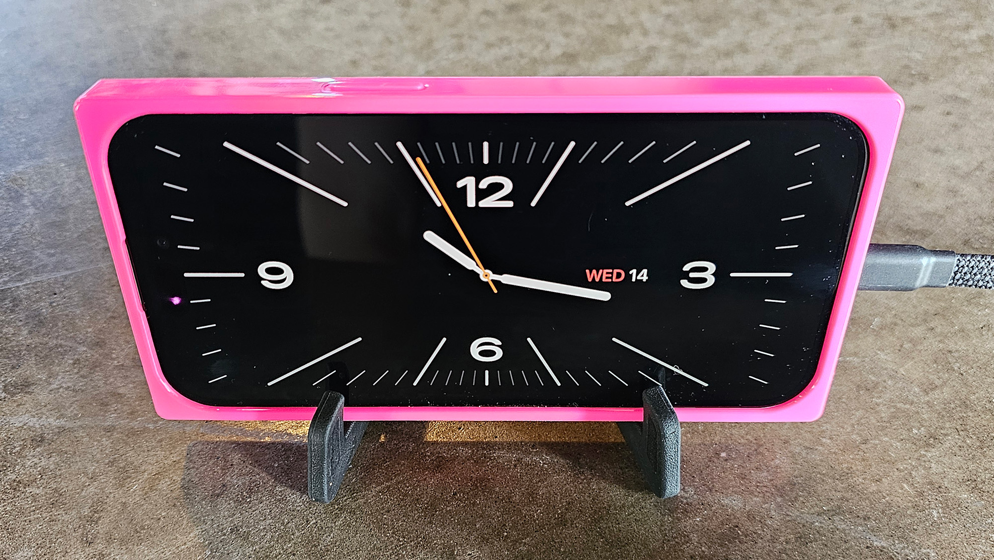 Upcycle your old iphone to an alarm clock