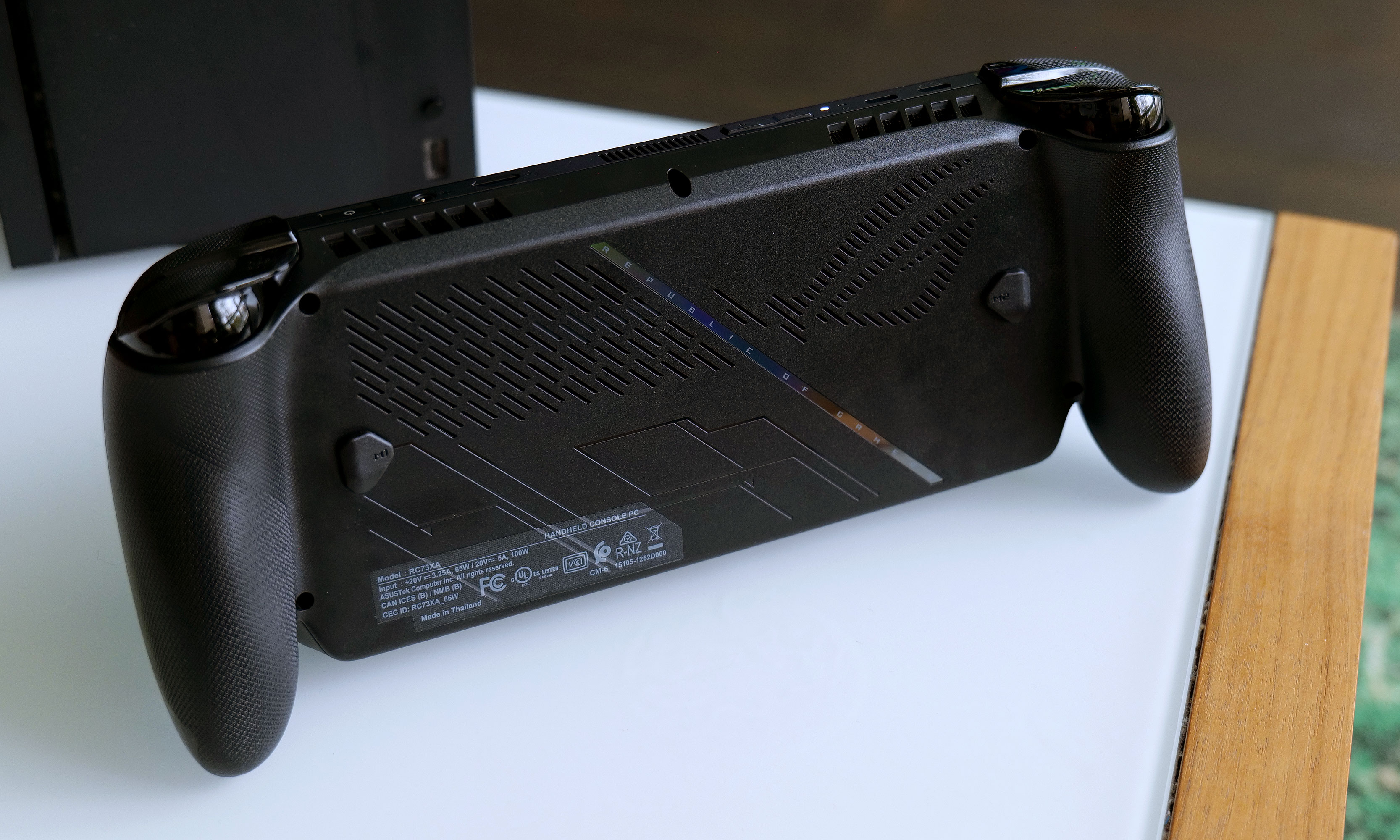 The back of the ASUS ROG Xbox Ally X features vents and two customizable rear paddles.