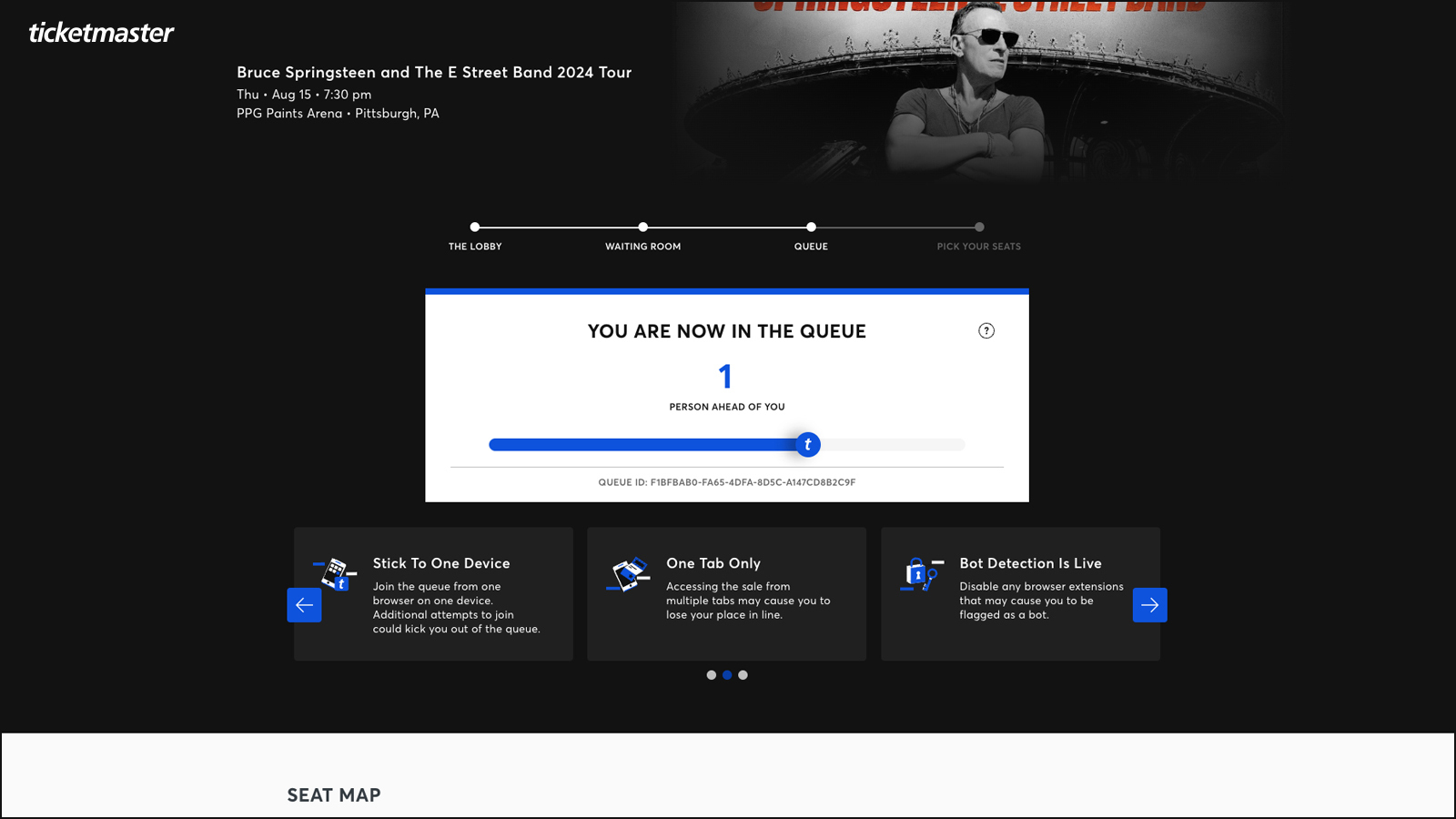 Screen showing a waiting queue for Bruce Springsteen tickets. It says one person is ahead of you.