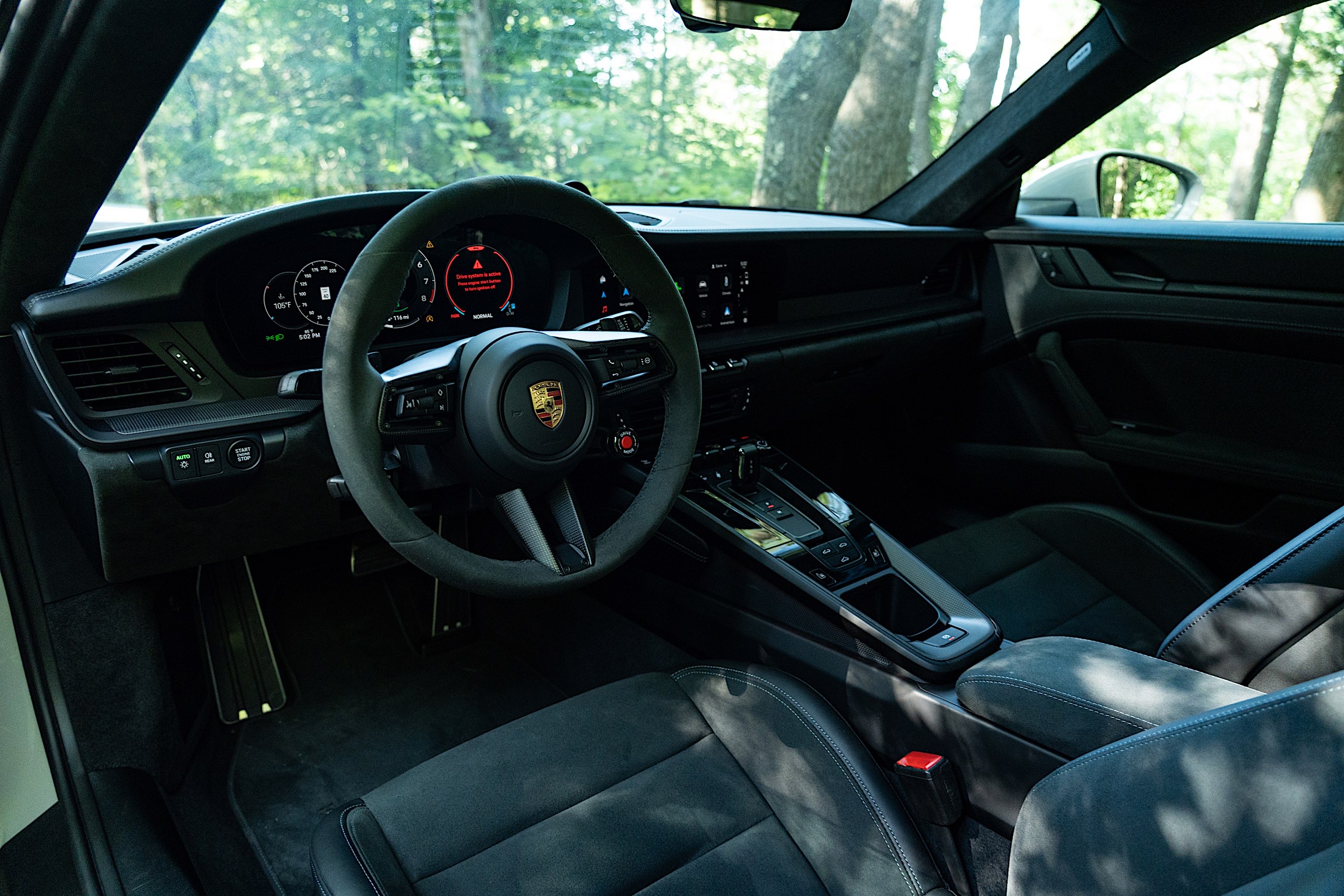The 2025 Porsche 911 GTS has a fun little red boost button on the steering wheel that's sure to give you a good time.