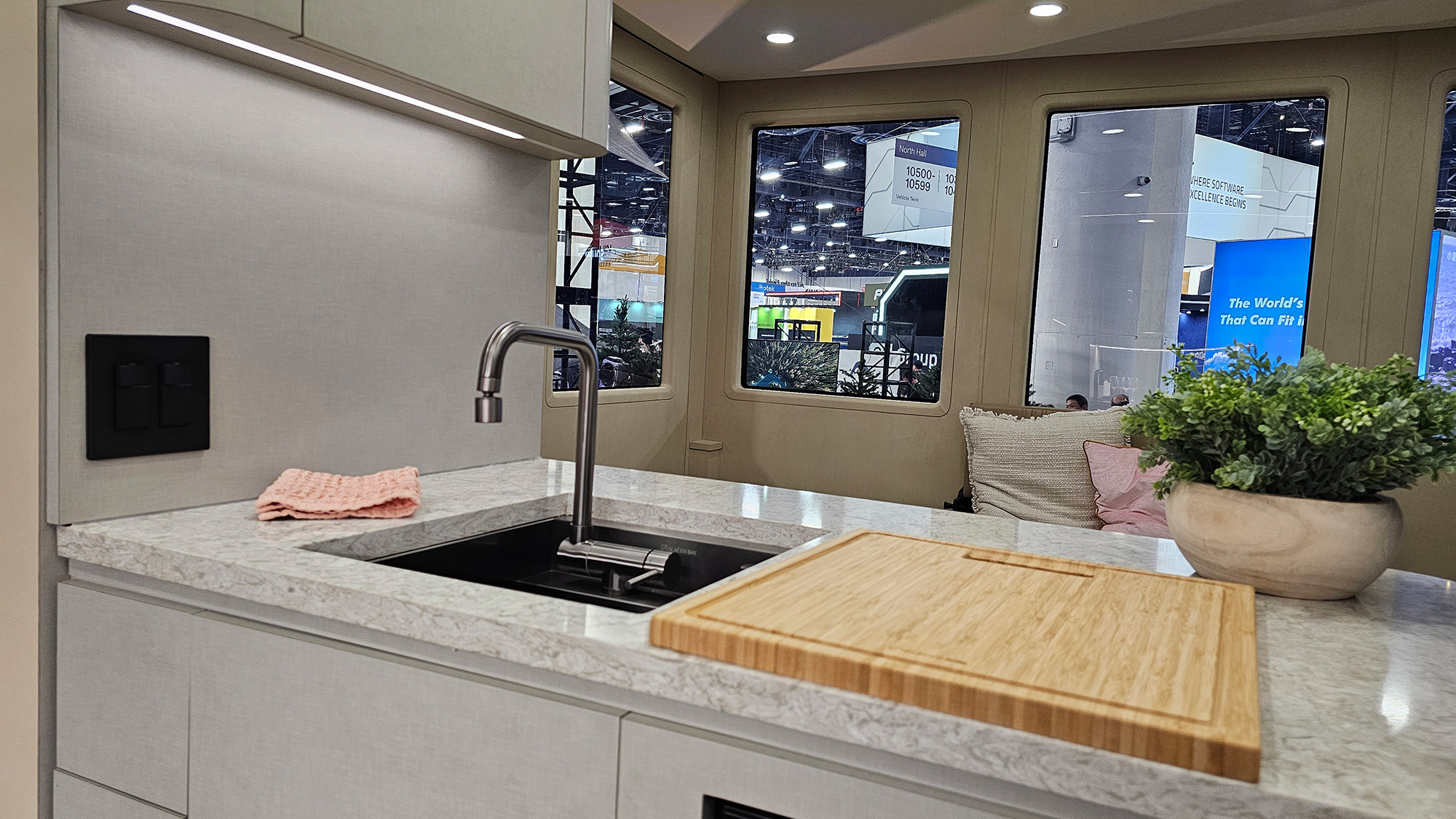 A shot of the sink and cutting board for the AC Future Ai-TH transformable home