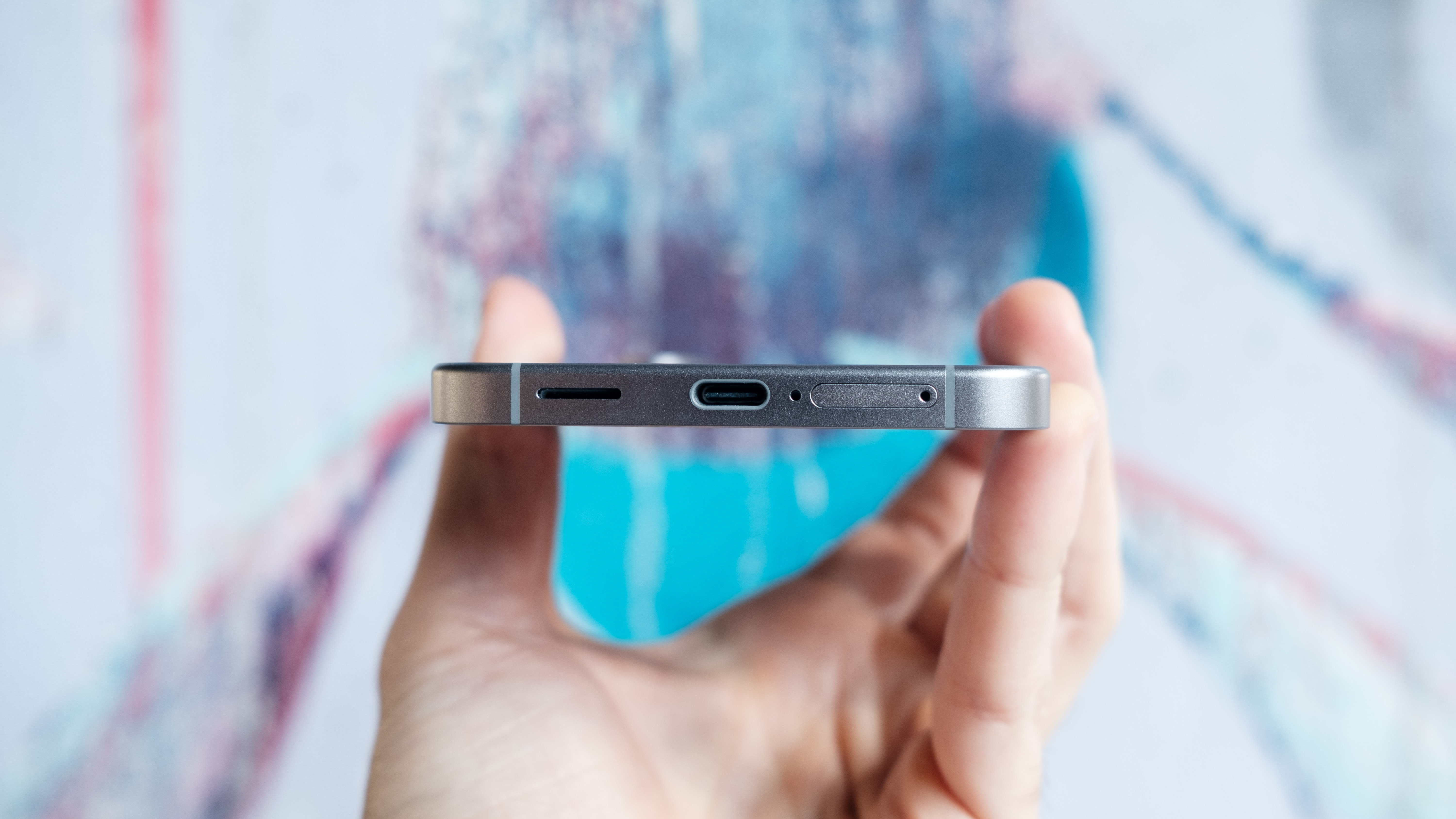 The S25 FE's SIM slot is now located on the bottom of the phone. 