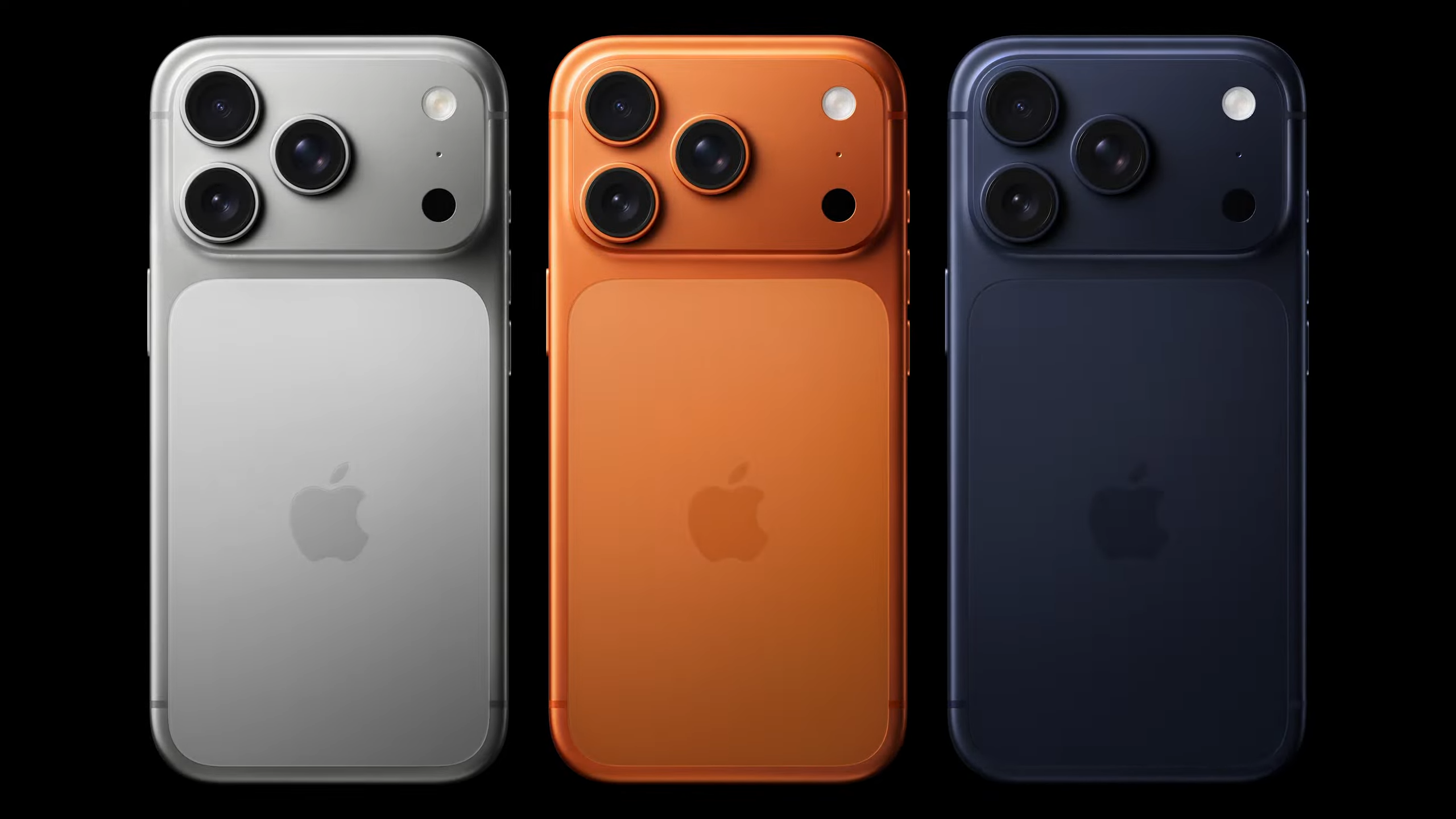 Three iPhone 17 Pro phones.