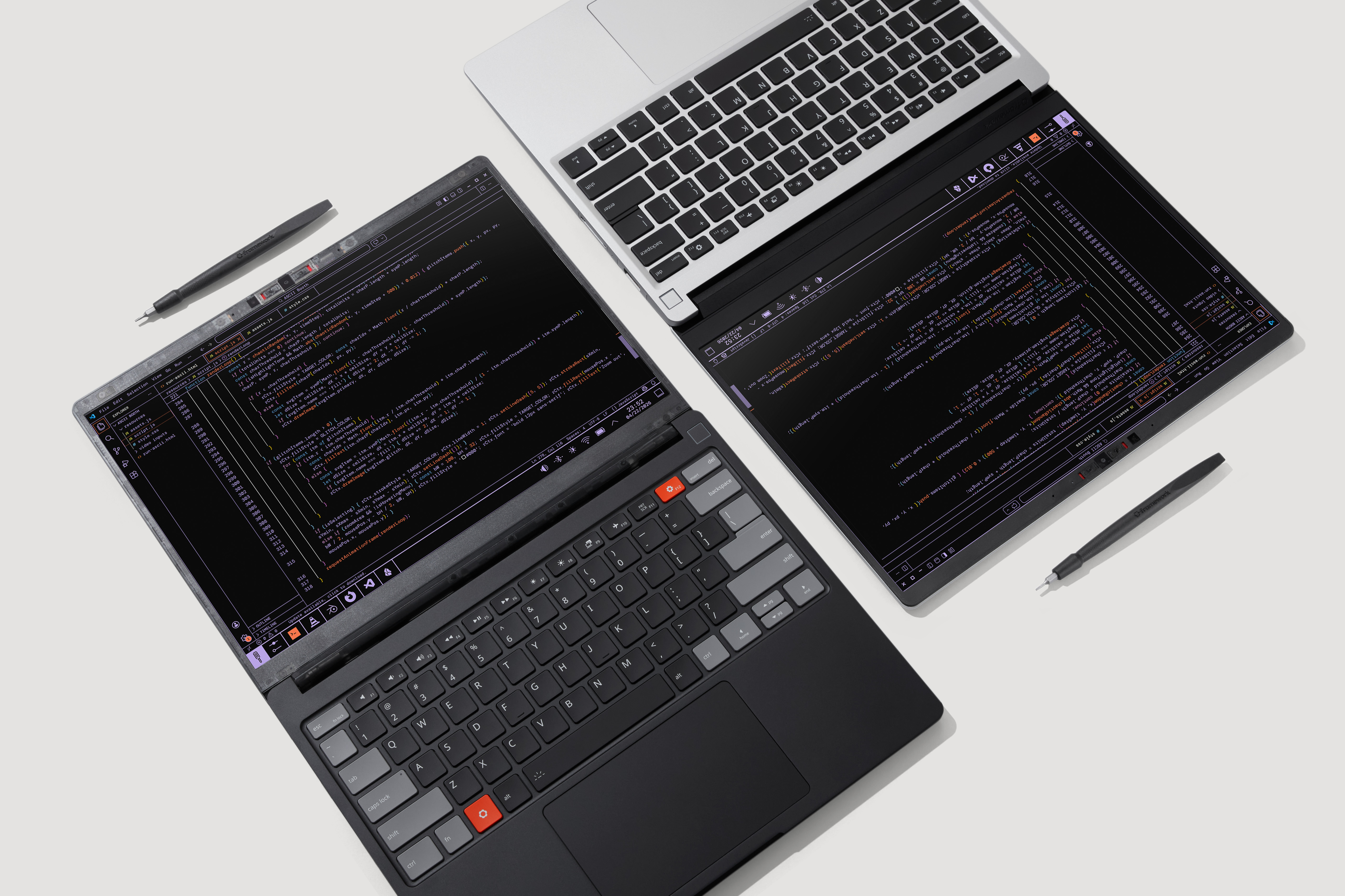 Two Framework 13 Pro models side by side.