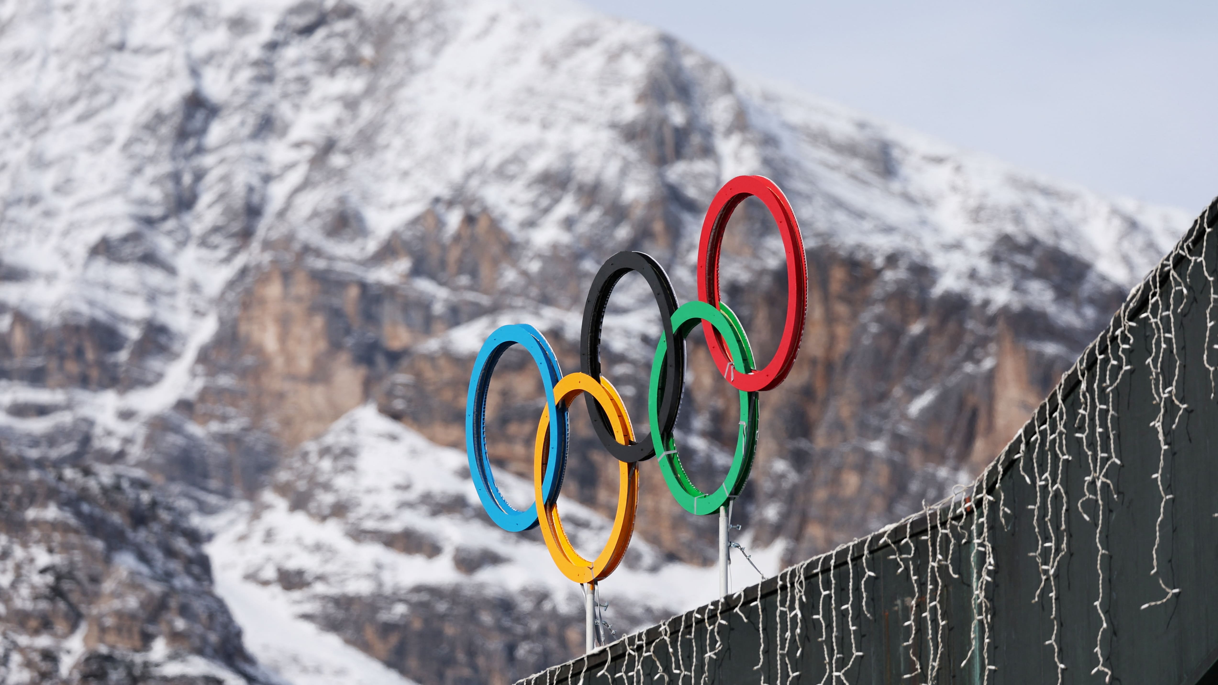 A general view shows the Olympic rings on the Cortina Curling Olympic Stadium, which will host the curling, wheelchair curling, and Paralympic closing ceremony during the Milano Cortina Winter Olympic Games 2026, in Cortina, Italy, January 25, 2025. REUTERS/Claudia Greco