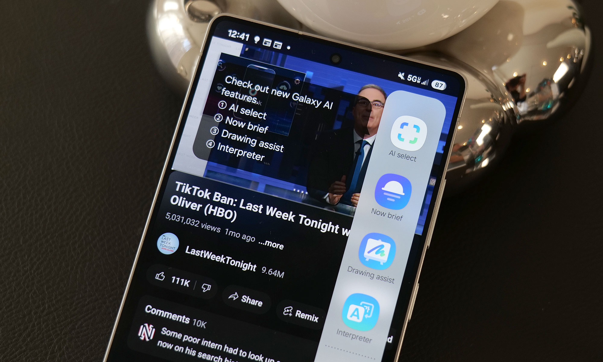 Closeup of the Galaxy S25 with AI features on its screen.
