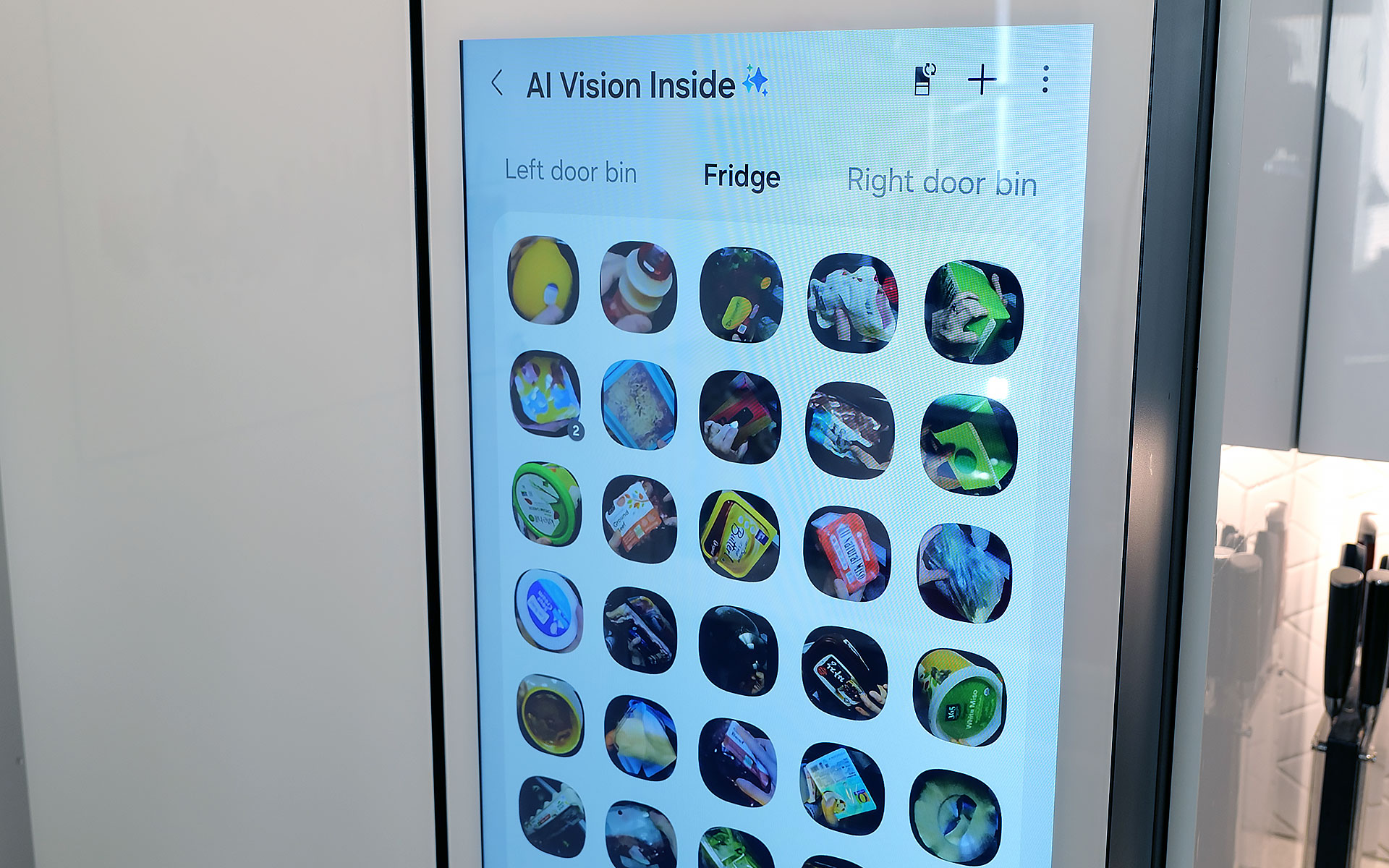 The fridge uses AI to automatically track food that it can recognize and applies labels to the corresponding photo. 
