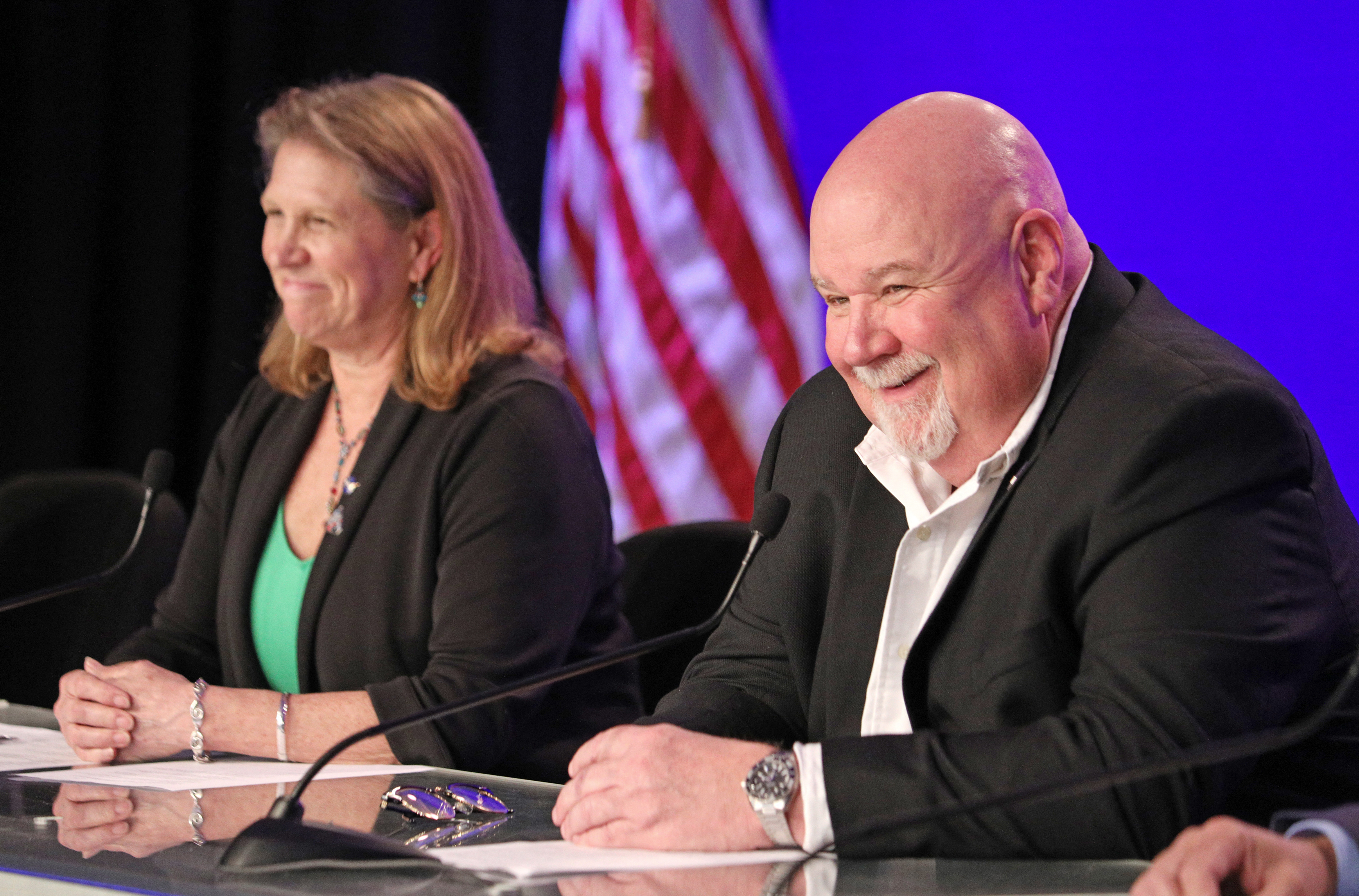 Lori Glaze, acting associate administrator, Exploration Systems Development Mission Directorate looks on as John Honeycutt, the Artemis II Mission Management Team chair smiles before answering a question about the flight readiness review of the Artemis II rocket components at the Kennedy Space Center in Cape Canaveral, Florida, on March 12, 2026. NASA rolled the massive Space Launch System rocket and Orion spacecraft back to the Vehicle Assembly Building from Launch Pad 39B on February 25 to troublshoot problems encountered during a wet dress rehearsal. NASA engineers and technicians will effect repairs and replace numerous flight batteries prior to sending four astronauts to the moon for the first time in more than 50 years. Artemis II is scheduled to launch in April. (Photo by Gregg Newton / AFP via Getty Images)