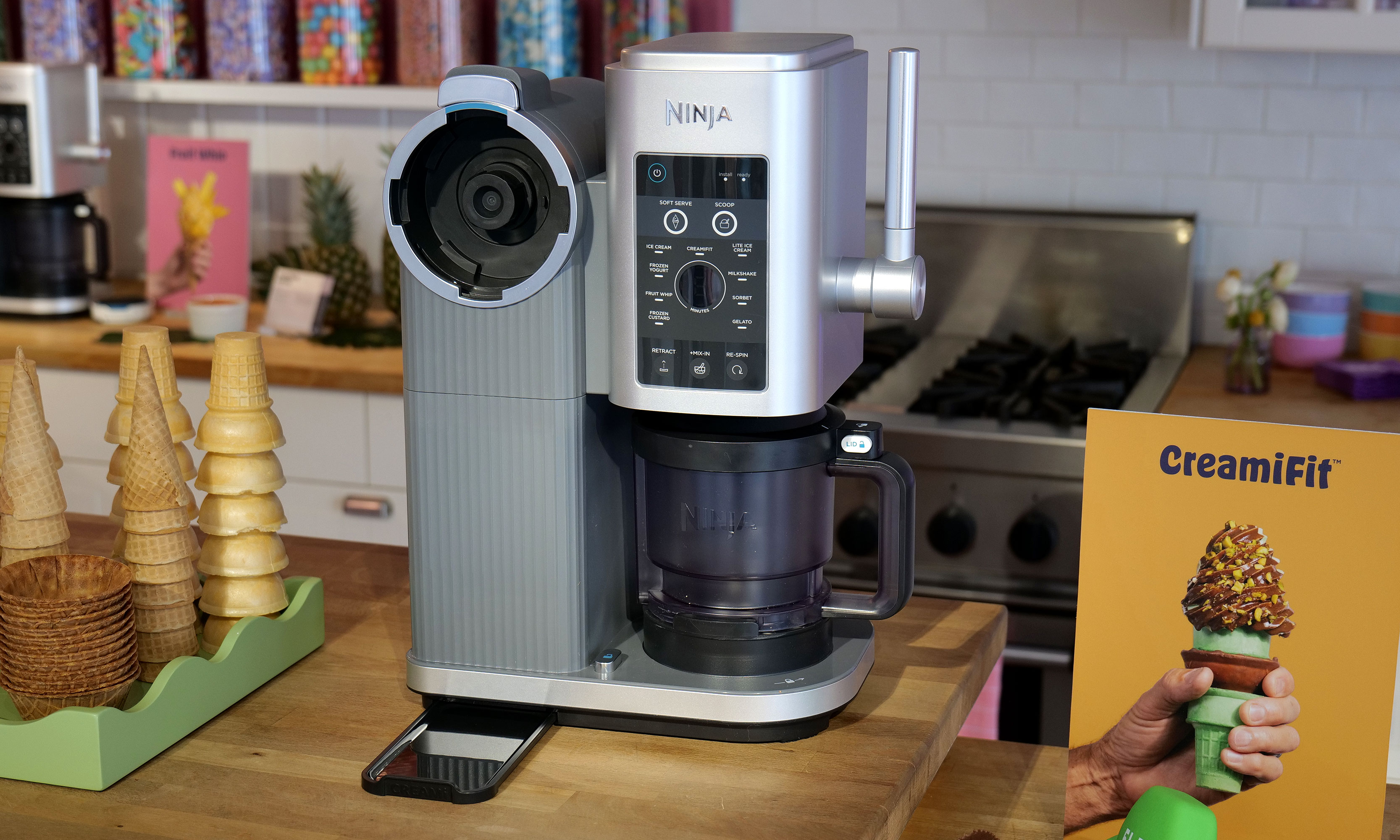The module on the left side of the machine is dedicated to making soft serve, which can be dispensed using the large handle on the right. 