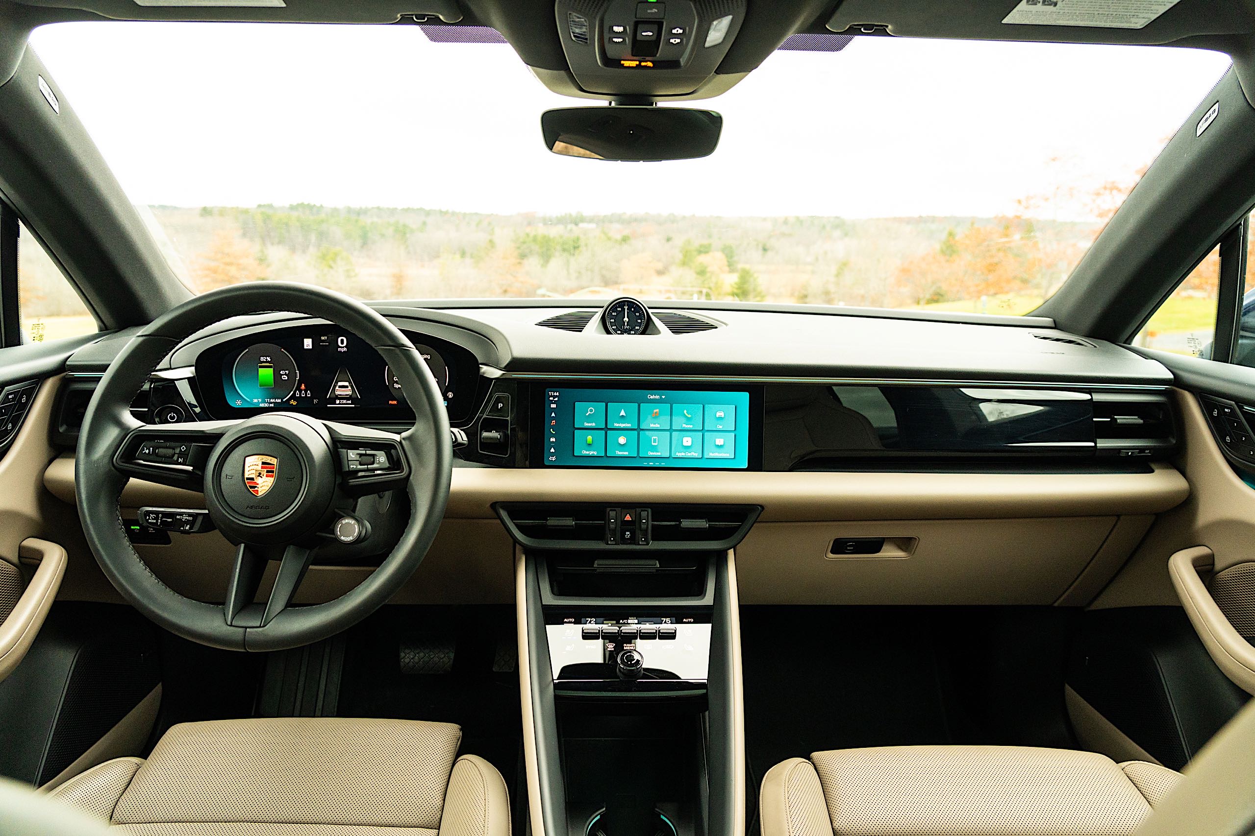 The Macan's interior is equipped with multiple displays. 