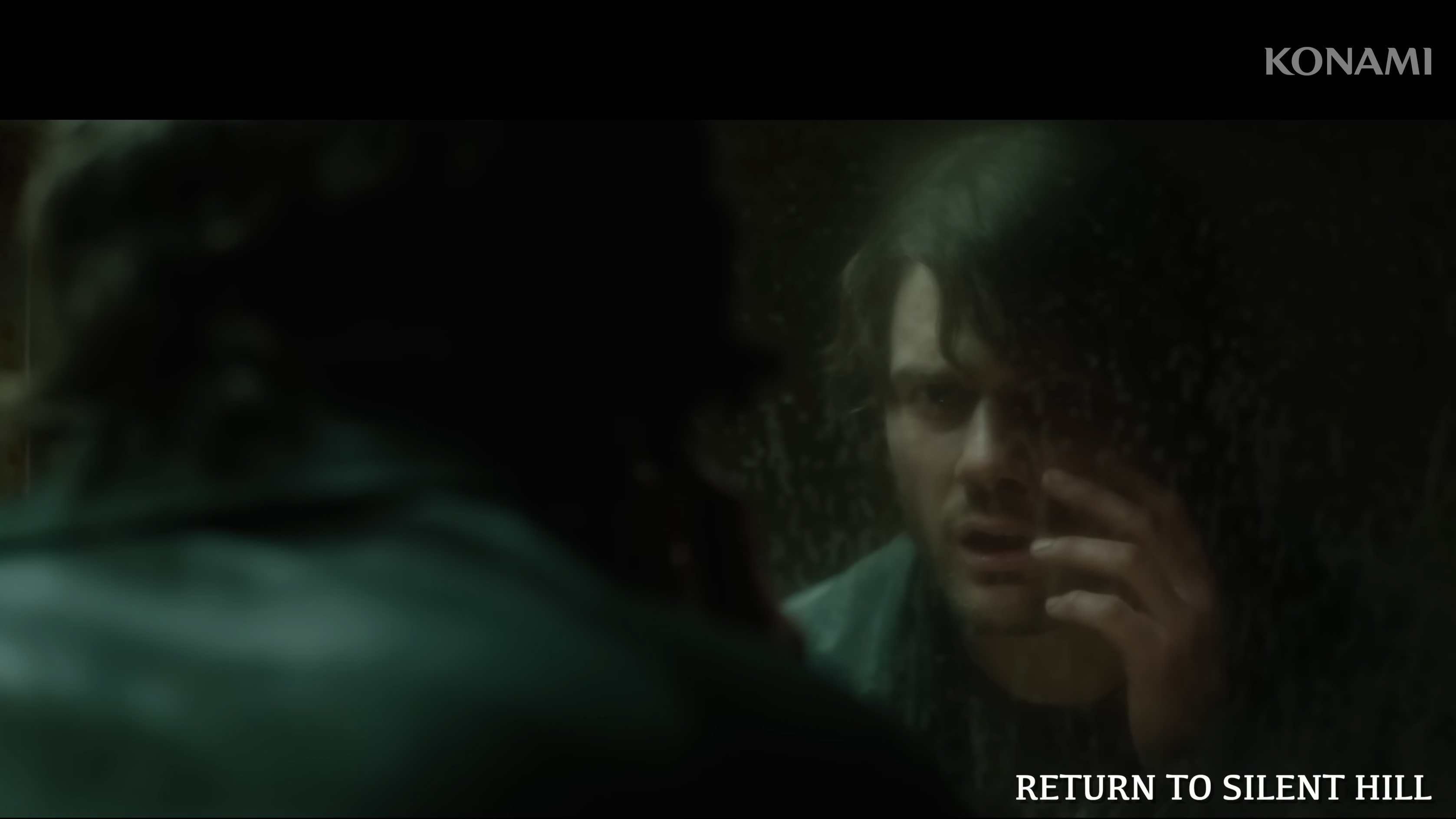 James looking in the mirror with horror. Still from the movie Return to Silent Hill.