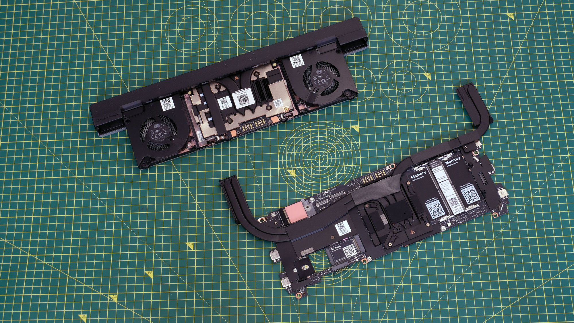 Image of the 2025 mainboard and expansion modules for the Framework Laptop 16.