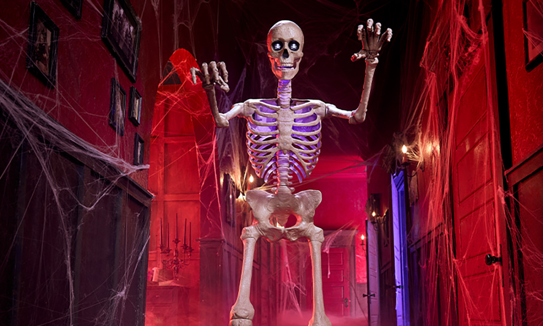 A skeleton with lights in a menacing pose.