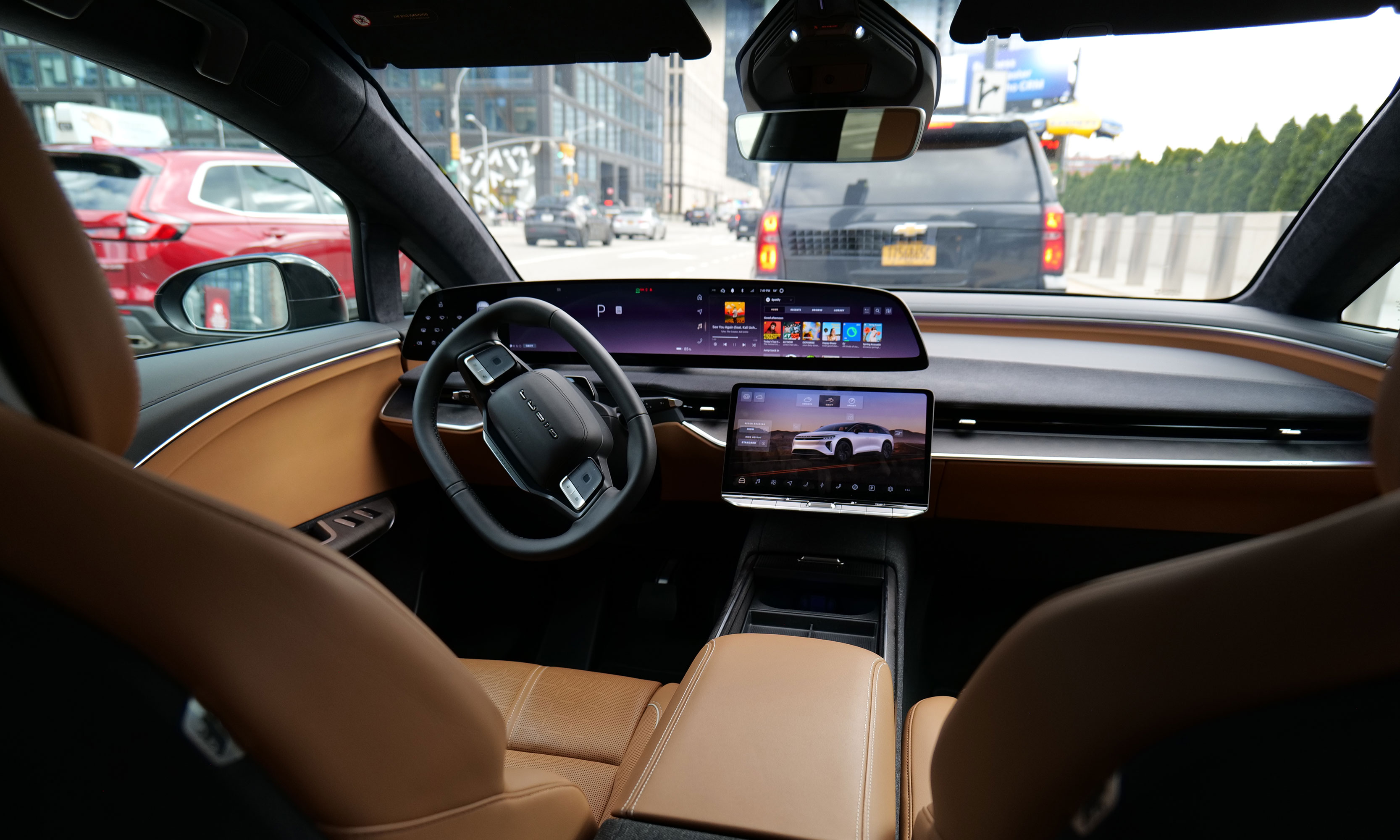 The Lucid Gravity features a huge 34-inch panoramic display alongside a smaller (but still big) screen for controlling music, climate and more. 