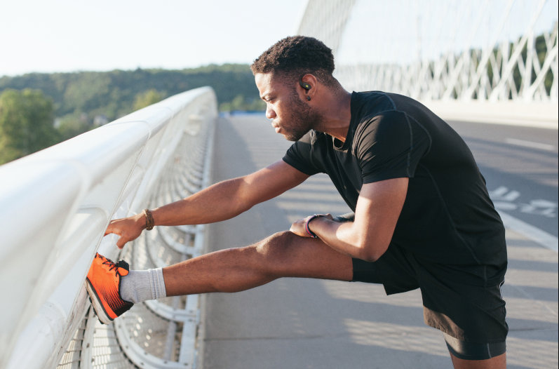 Some earbuds on a dude.