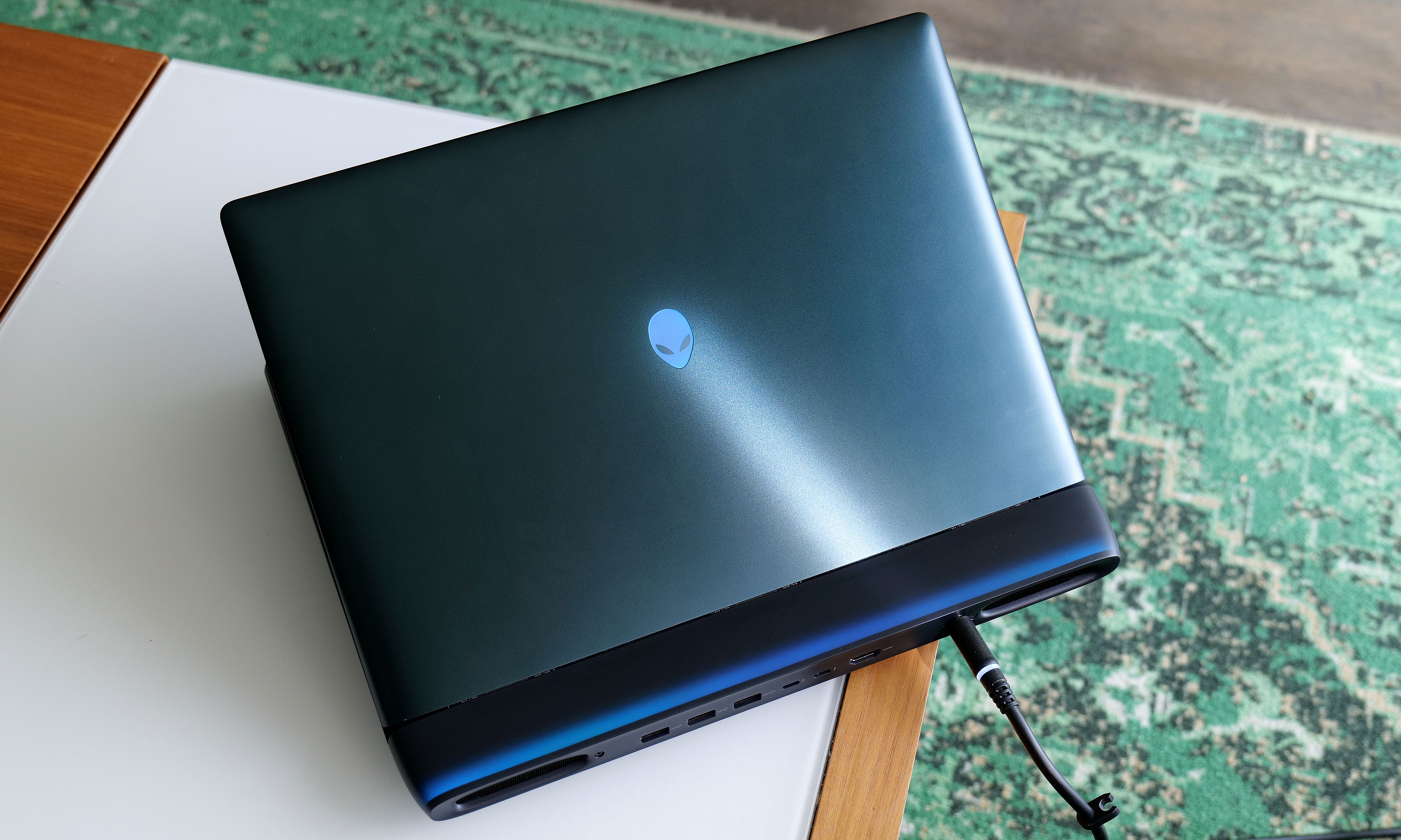 Depending on the light, Alienware's Liquid Teal paintjob can shift between emerald green, blue and several other colors. 