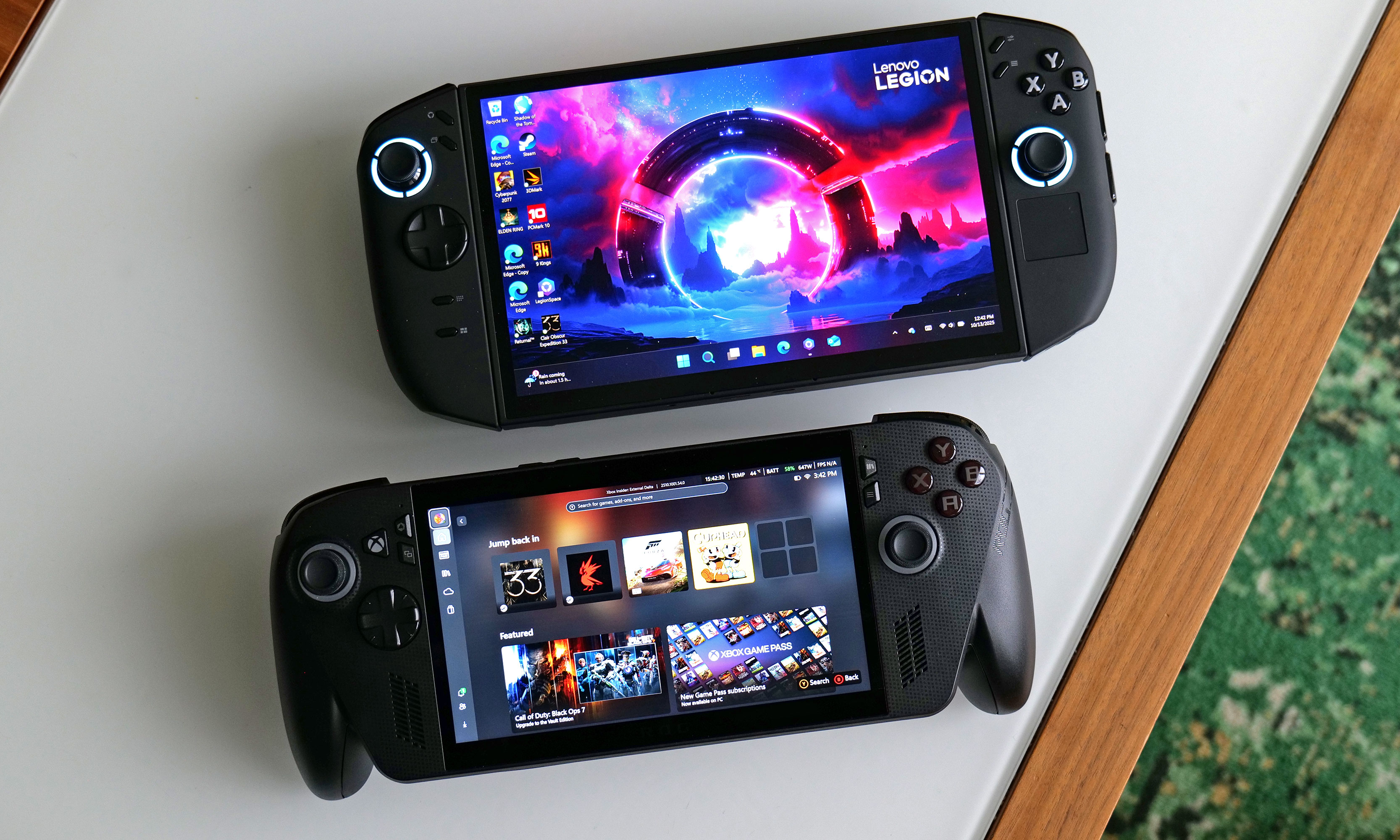 Here is a size comparison between the ASUS ROG Xbox Ally X (bottom) and the Lenovo Legion Go 2 (top). 