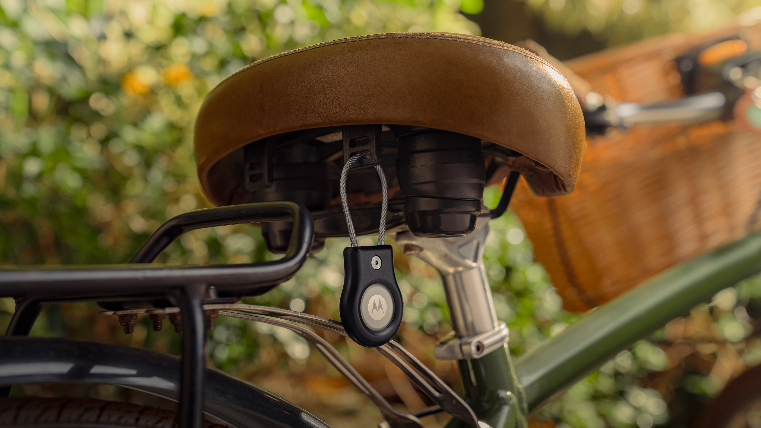 A bike seat with a Moto Tag 2 attached to it.