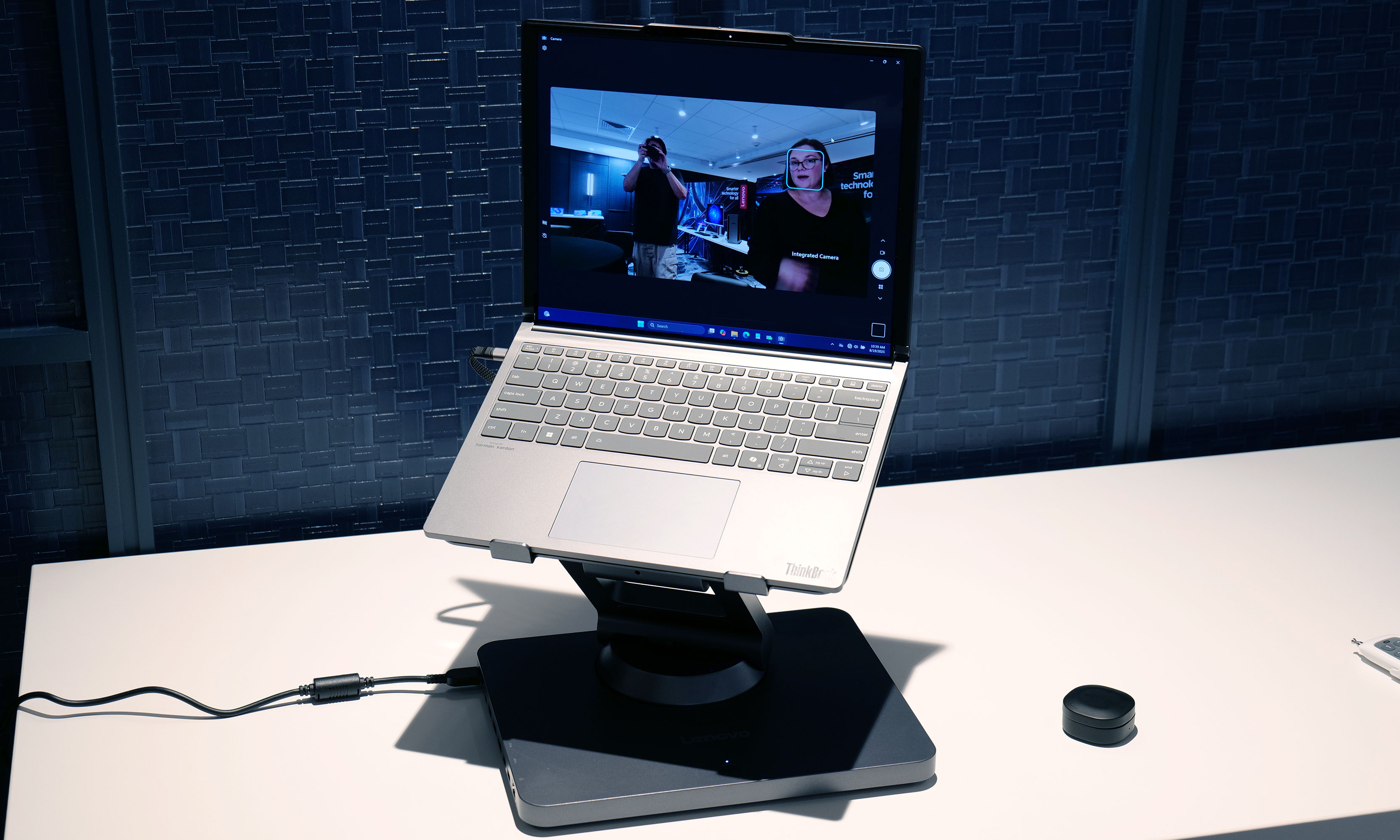 The Lenovo Smart Motion Concept is a laptop stand that uses the sensors and cameras from a connected system to automatically track you and follow you around wherever you go for things like meetings and presentations. 