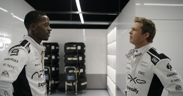 Still from F1, where Damson Idris and Brad Pitt stare into each other's eyes, mournfully. Still from F1, where Damson Idris and Brad Pitt stare into each other's eyes, mournfully.