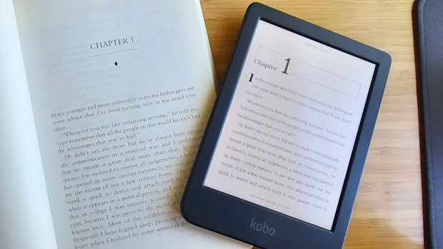 Image of a Kobo e-reader next to a book, both open on the same chapter Image of a Kobo e-reader next to a book, both open on the same chapter